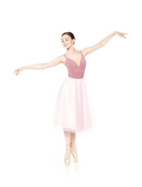 Pembe etek ve bej üst dans bale zarif kız.