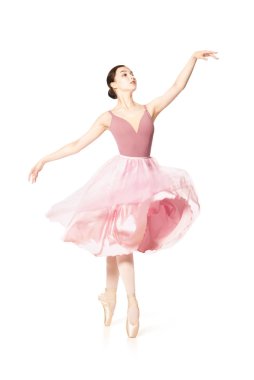 Pembe etek ve bej üst dans bale zarif kız.