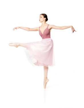 Pembe etek ve bej üst dans bale zarif kız.