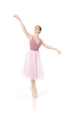 Pembe etek ve bej üst dans bale zarif kız.