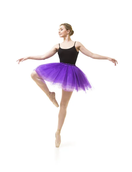 Fille en tutu violet et justaucorps noir danse ballet . — Photo