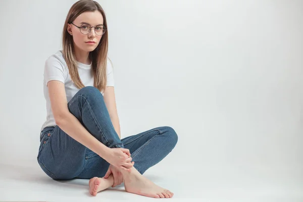 Close up portrait of serious model wearing round glasses — Stock Photo, Image