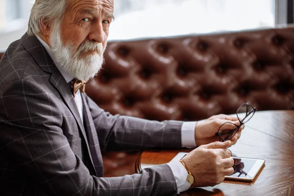 Cropped shot of white haired man with moustache and beard feels lonely — Stock Photo, Image