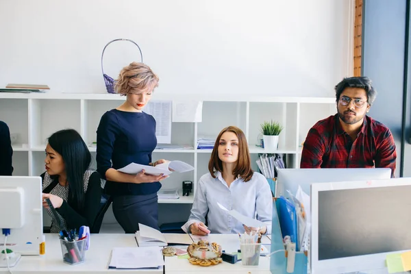 Working people in a small company. — Stock Photo, Image