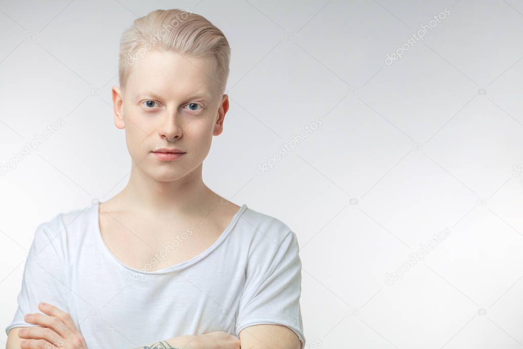 Portrait of young blonde man with healthy clean skin. Isolated on white