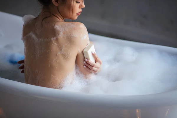 Close up cropped portrait of gorgeous girl washing arms with soap — Stock Photo, Image