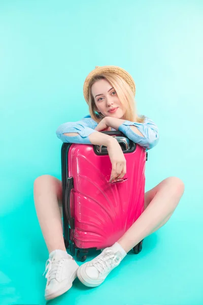 young nice woman carring luggage