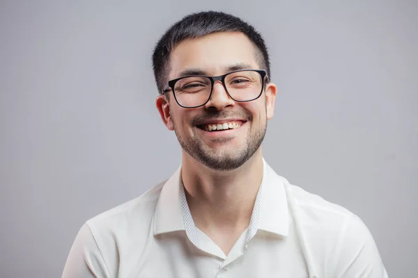 A carefree positive male in glasses — Stock Photo, Image