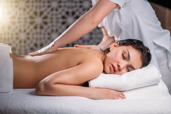 Deep preasure massage with intensive impact on the whole body — Stock Photo, Image