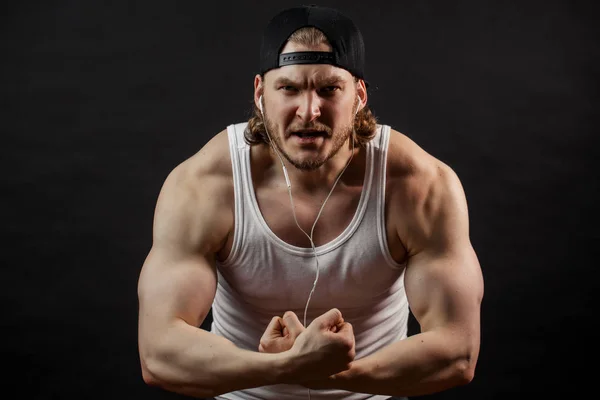 Muscles of iron. guy is developing his muscles — Stock Photo, Image