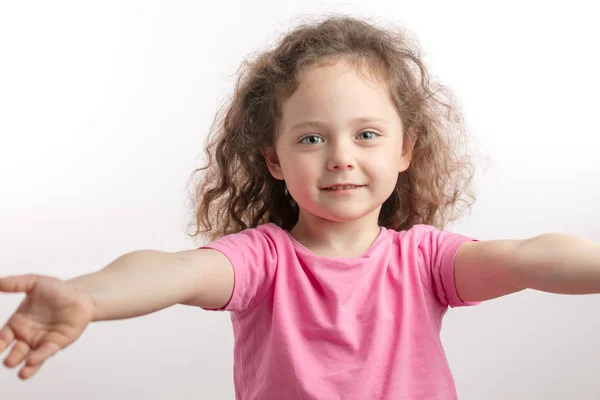 Kind, friendly girl is welcoming guests — Stock Photo, Image