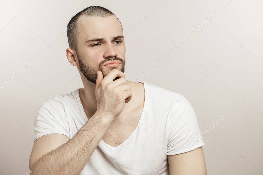 thoughtful upset man isnt satisfied with idea