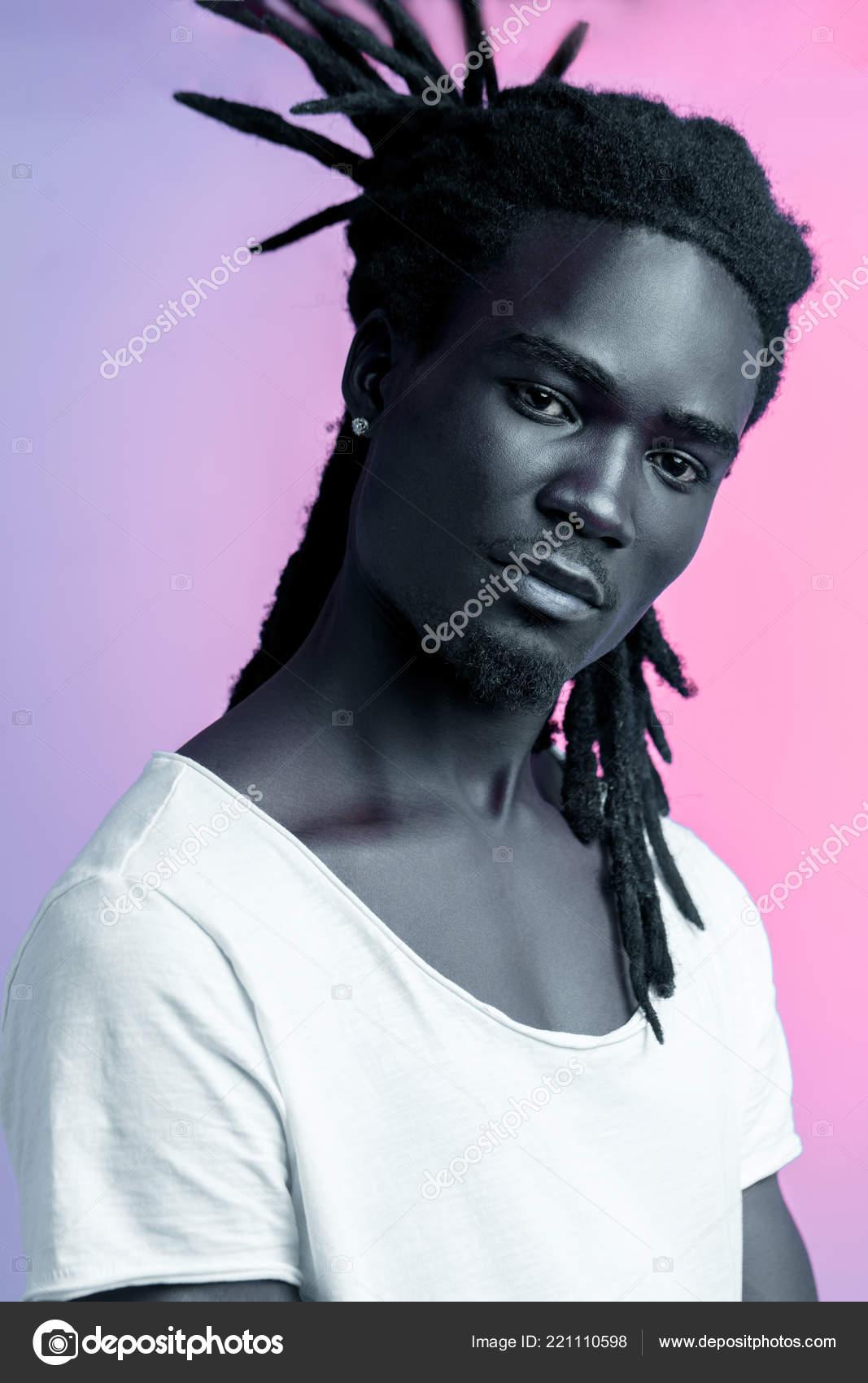 African Man Portrait Under Blue And Purple Lights Ultraviolet
