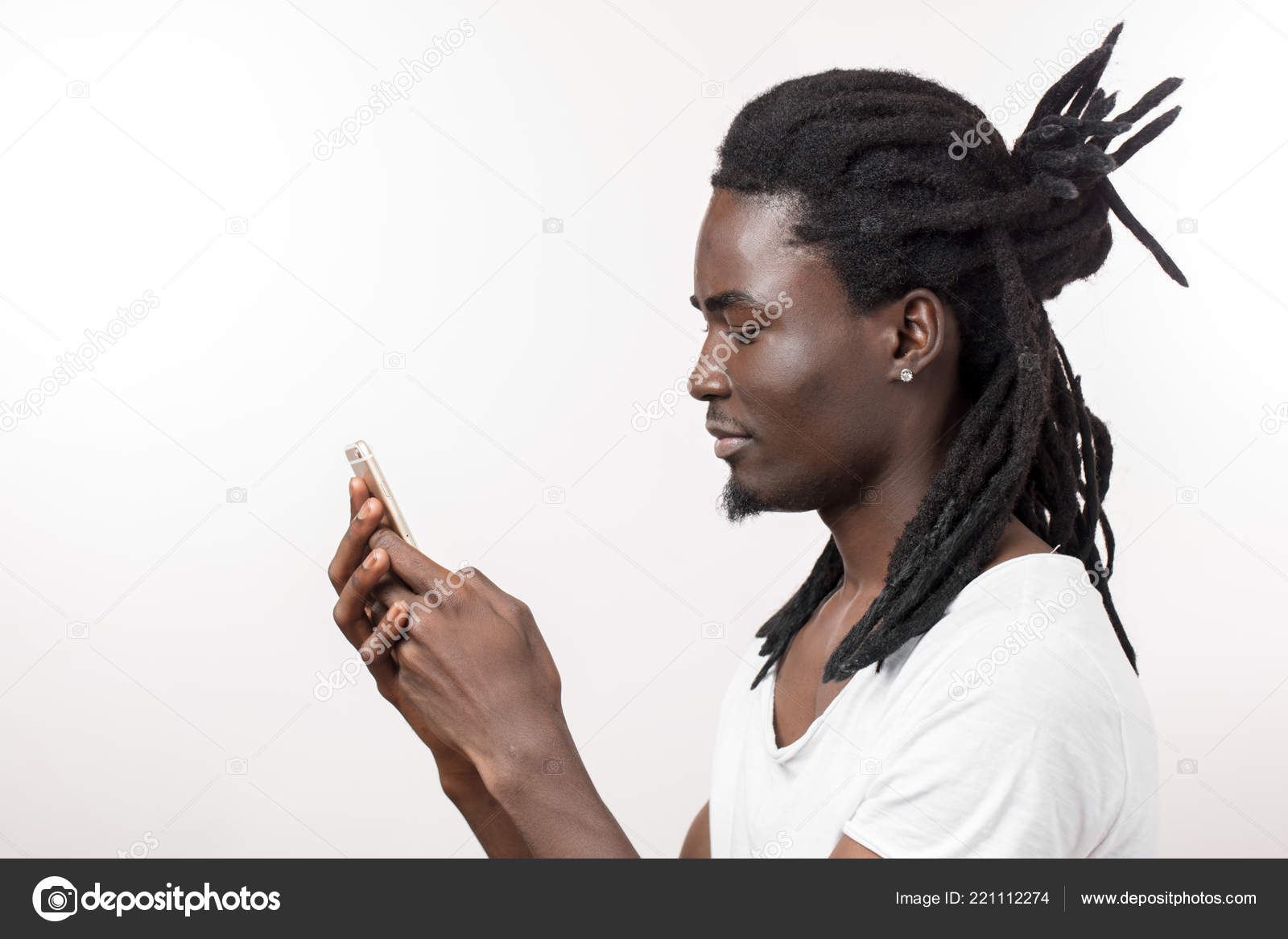 Afro American Man With Dreadlocks Viewing Photos In Social