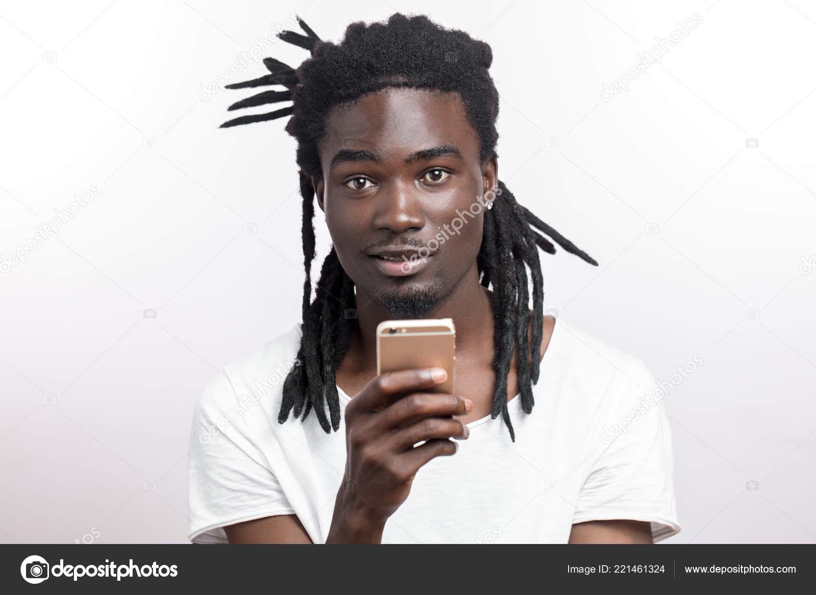 Dark Skinned Man Dreadlocks White Shirt Looking His