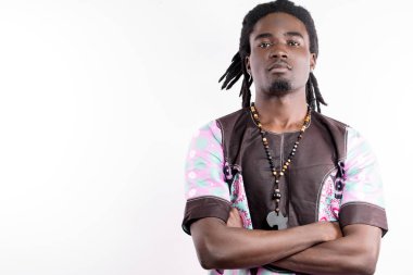 black man with dreadlocks in traditional colorful cloth clipart
