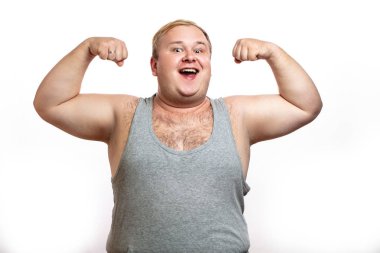 Funny overweight sports man flexing his muscle isolated on white background clipart
