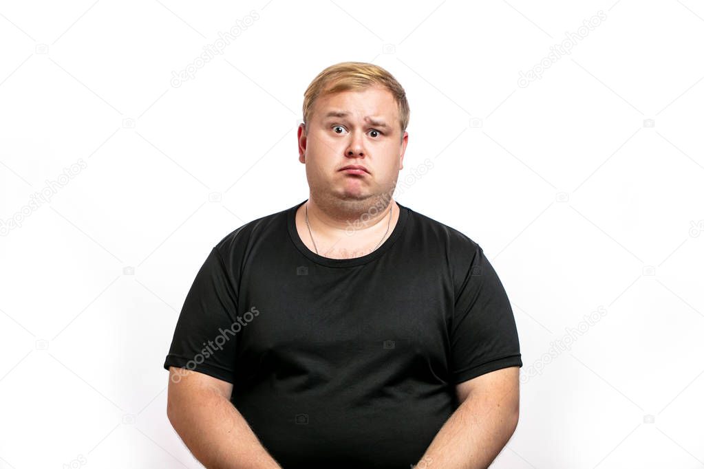 Big fat stout blonde man looking at camera with upset, disappointed expression, emotion. Isolated on white background.