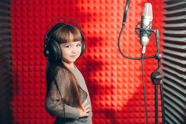 Young talented singer in headphones — Stock Photo, Image