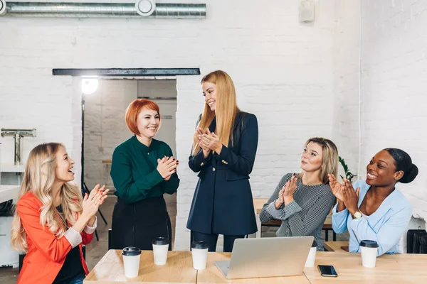 Businesswoman congratulates, hand shaking her colleague at meeting. — Stock Photo, Image