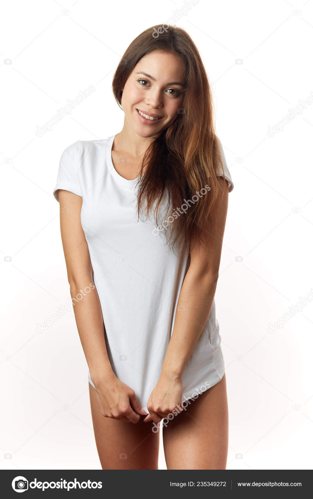 Smiling shy girl in stylish t-shirt and underwear Stock Photo by  ©ufabizphoto 235349272