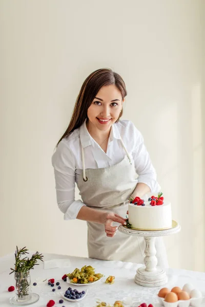 confectionery industry , girl selling sweet baked goods