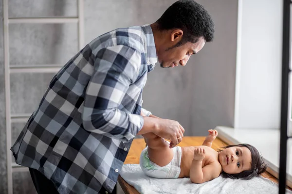 Man is caaring for his little adorable child — Stock Photo, Image