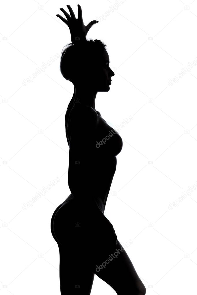 sexy striptease dancer standing over white background, studio shot