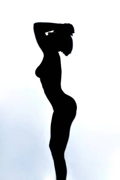 Crying sad unhappy womans silhouette with raised arms above her head — Stock Photo, Image