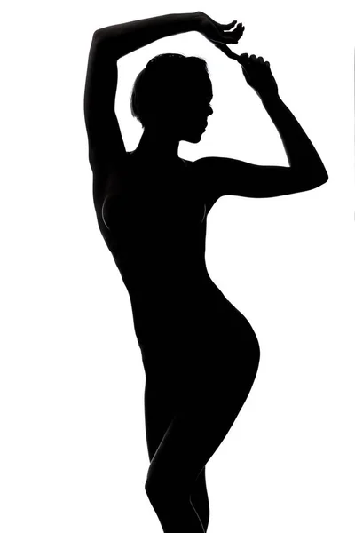 Grazia silhouette di ragazza che si vanta del suo corpo ideale — Foto Stock