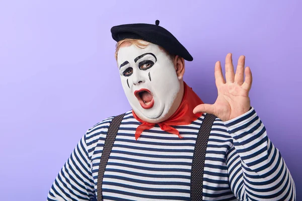 Funny plump clown with raised arm shoiting at the camera — Stock Photo, Image