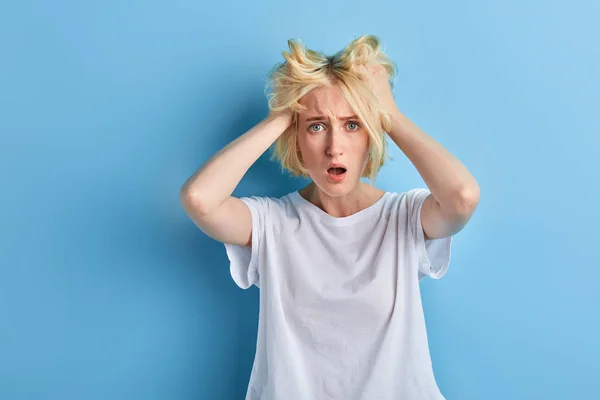 Sleepy angry frustrated tired woman touching her head — Stock Photo, Image