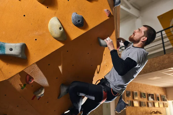 Positive climber with physical disability makes success in bouldering sport