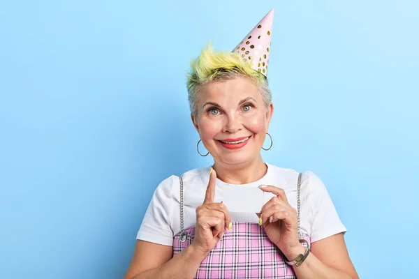 wishes come true. positive cool old woman has prepared a present for family