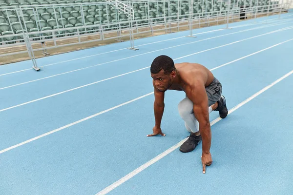 Pleasant attractive man preparing for a competition — Stock Photo, Image