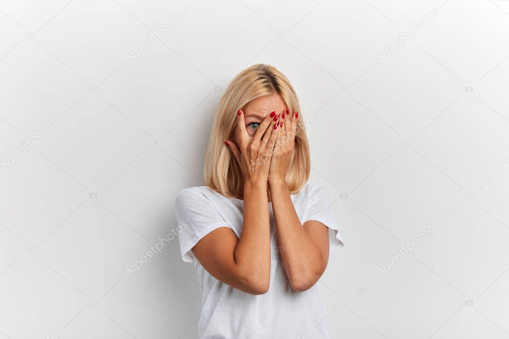 nervous emotional woman is being afraid of loan