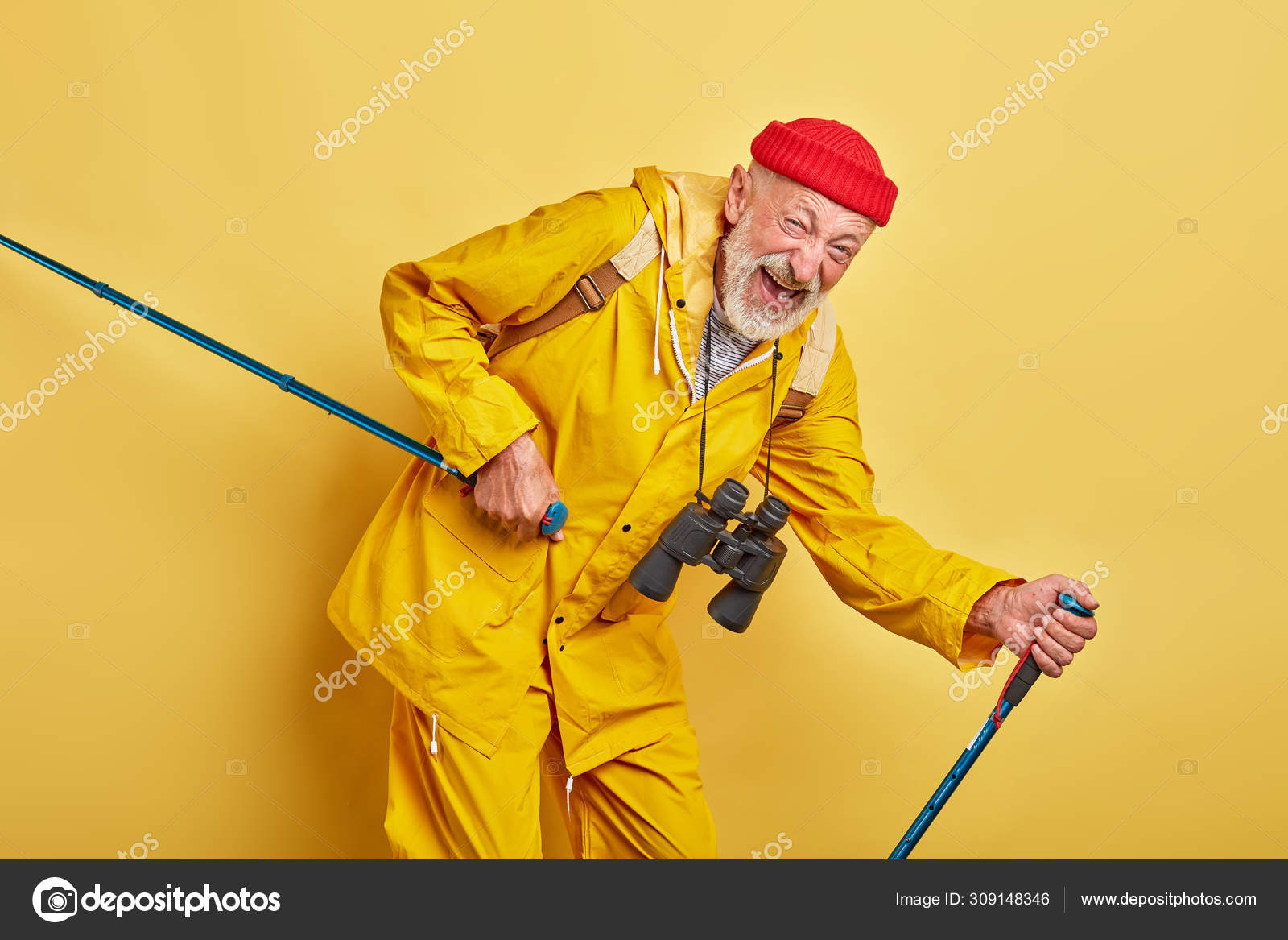 Old crazy funny man walking with poles Stock Photo by