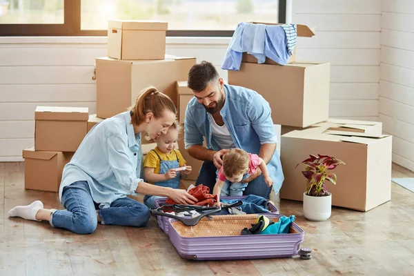 Caucasian family move in new house