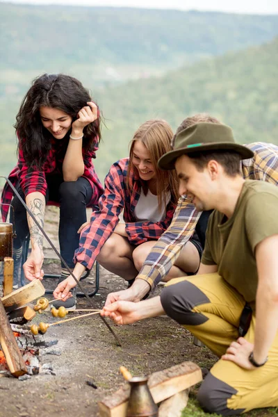 positive young students having picnic