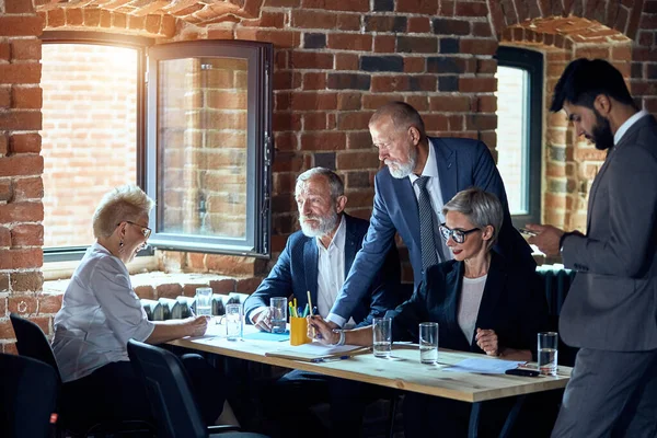 Businessmen work in office