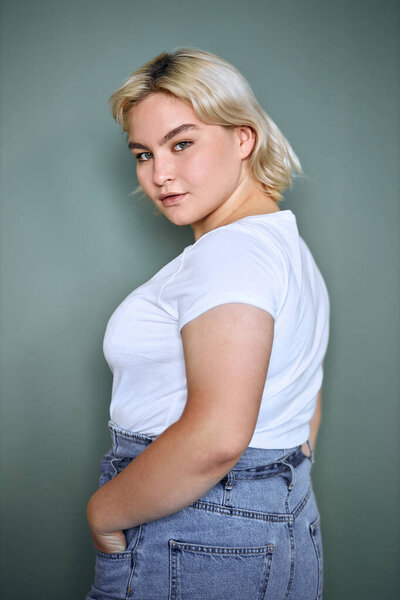 Portrait of complete girl isolated on grey background