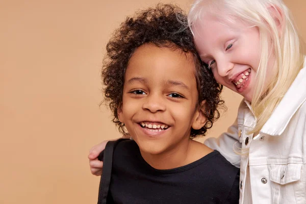 Friendly children, tender african and albino kids — Stock Photo, Image