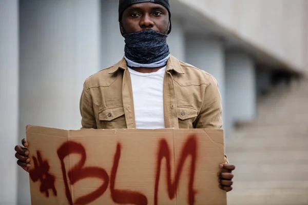 black man protest against injustice, blm concept