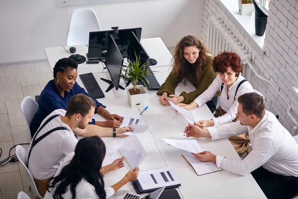 Top view on business people at table in office meeting — Stock Photo, Image