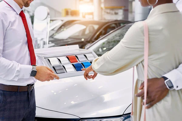 lets take this one. woman choose the best colour of their future car