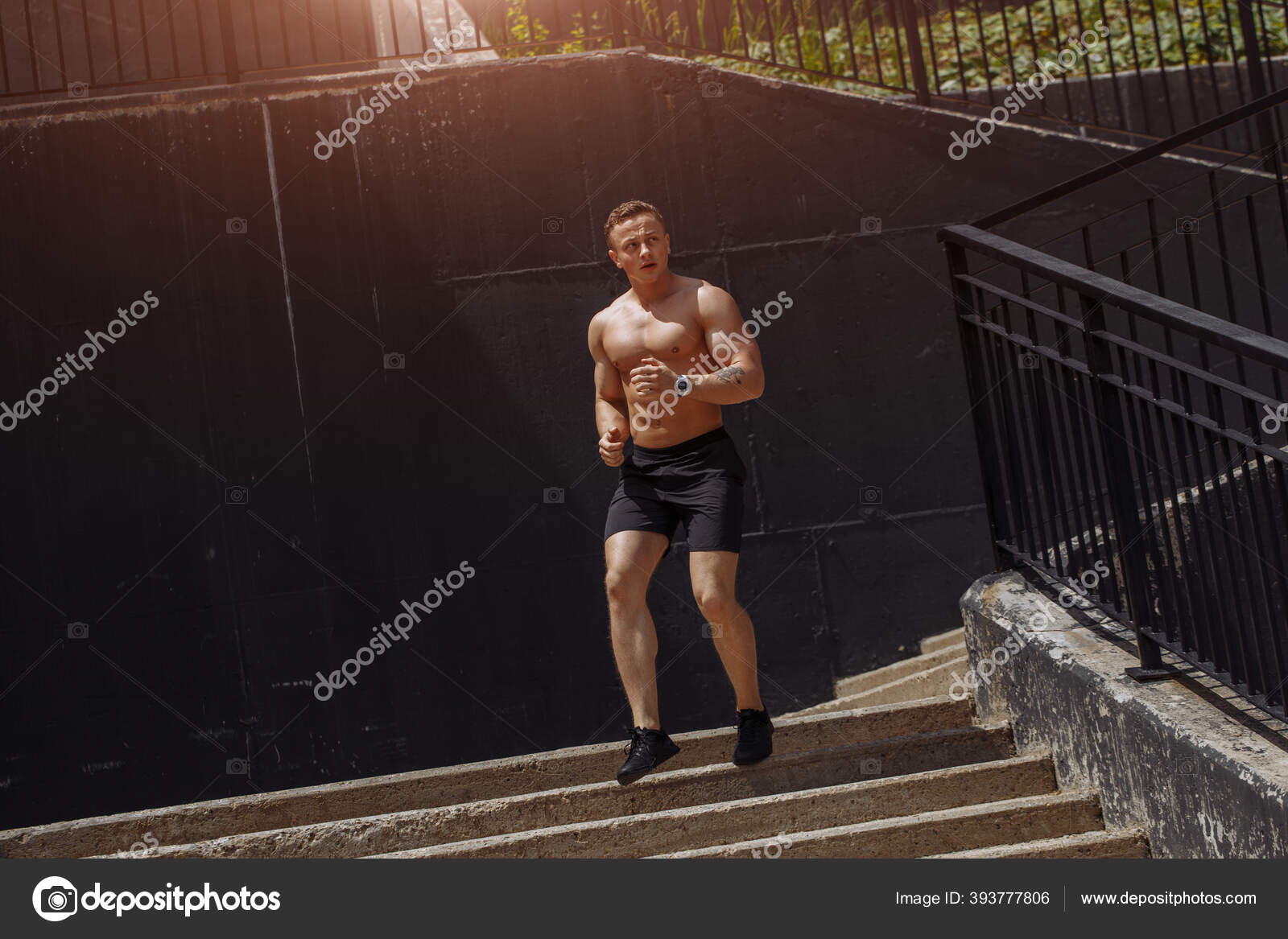 Athletic Sport Runner Man Running In Urban Training Stock Photo