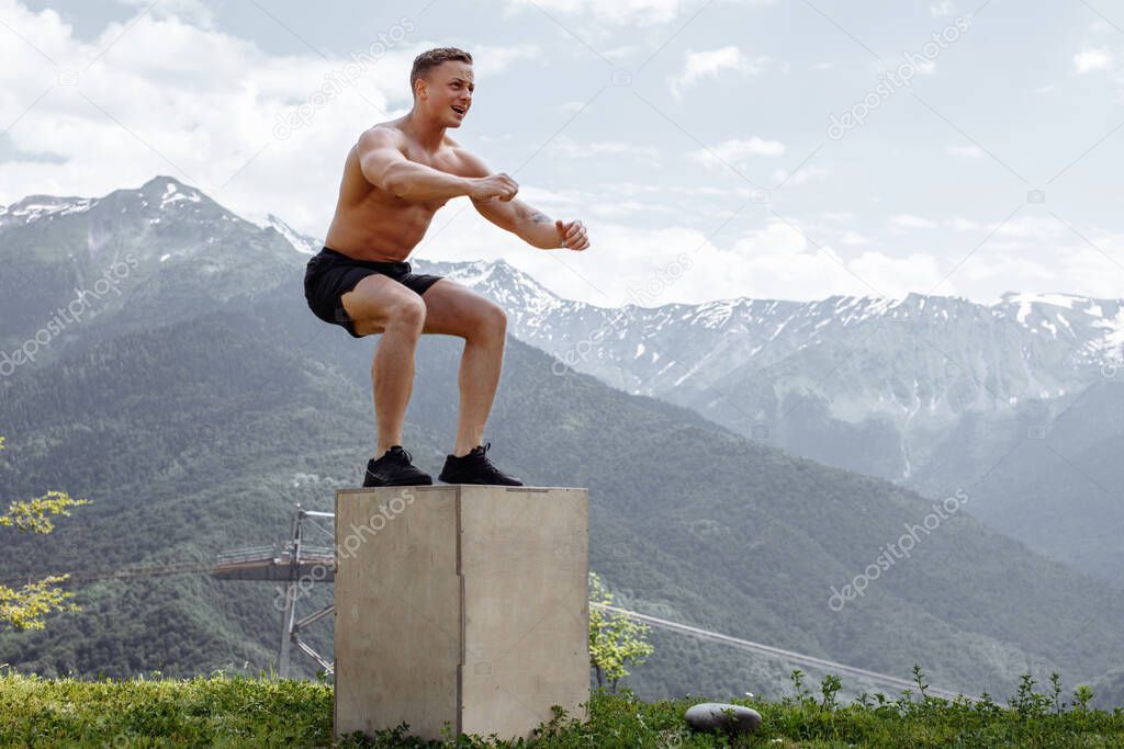 Male jumper doing explosive strength jumps, crossfit fitness workout