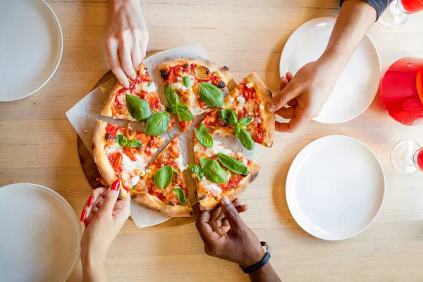 stock image View from above the table of friends eating