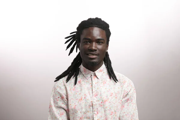 Happy Afro-American man smiling isolated on white studio background. African American male profile portrait — Stock Photo, Image