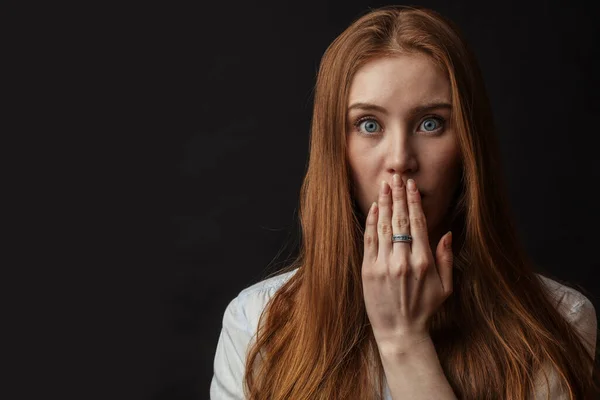 Tender young woman with beautiful eyes and long loose ginger hair — Stock Photo, Image